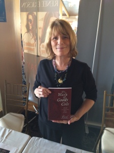 Author Cheryl Lassiter with her book, The Mark of Goody Cole.